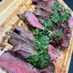 Butter seared New Zealand ribeye steak topped with Chimichurri sauce