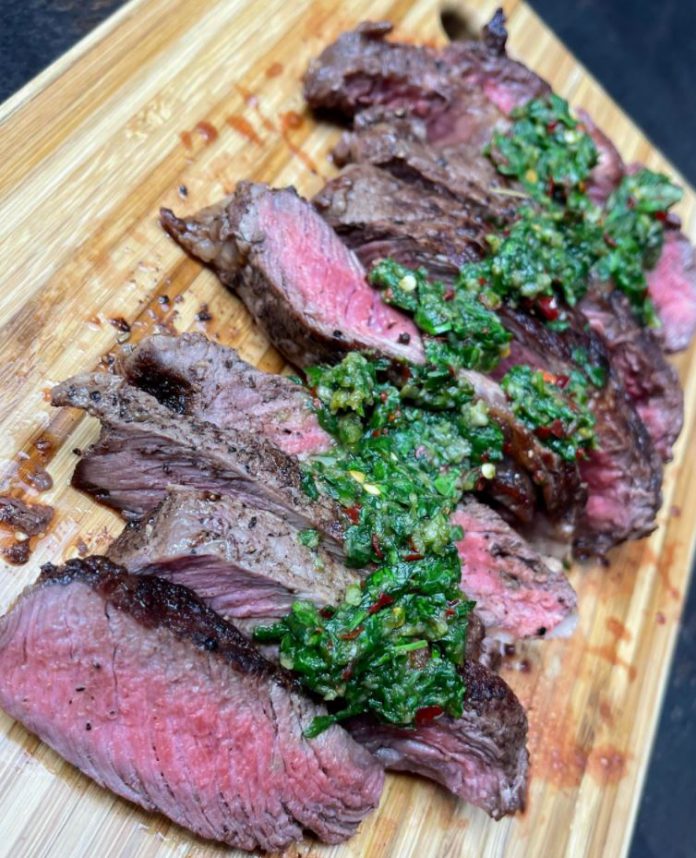 Butter seared New Zealand ribeye steak topped with Chimichurri sauce
